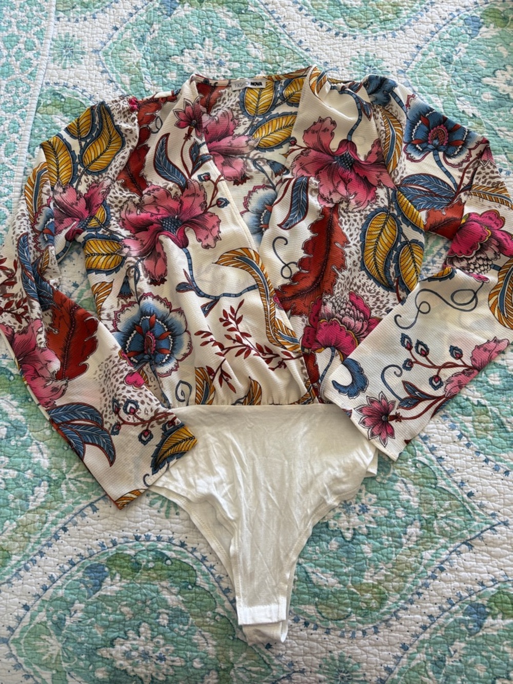 Fashion Nova Floral Long Sleeve Bodysuit in Cream, Pink, Blue, Yellow